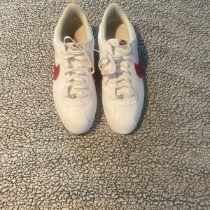 Nike White Leather Men's Sneakers with Red Swoosh Accent